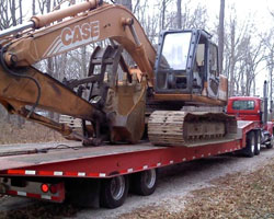 excavator getting moved